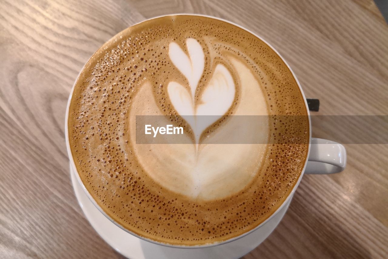 High angle view of cappuccino on table