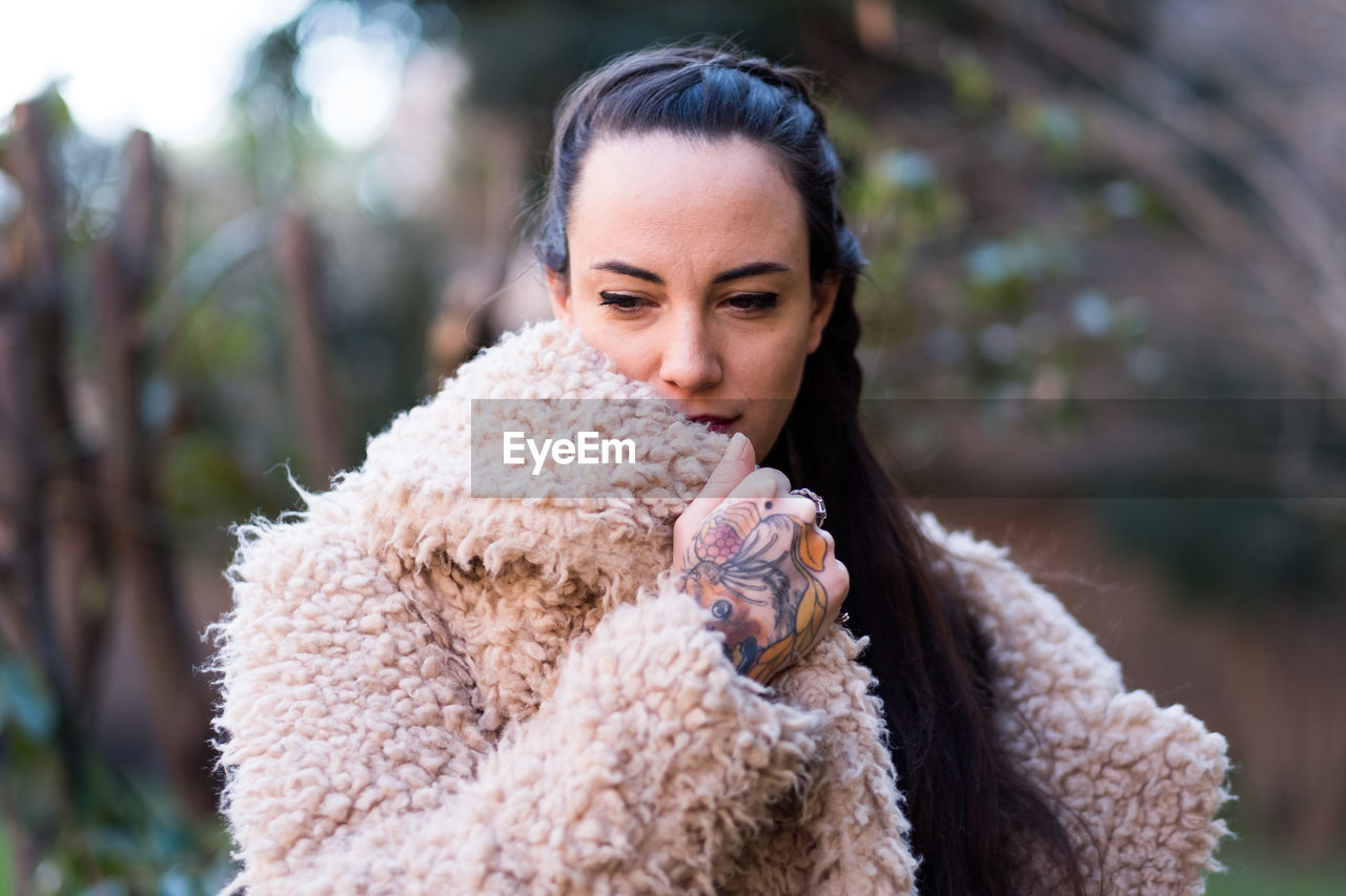 Young woman wearing warm clothing