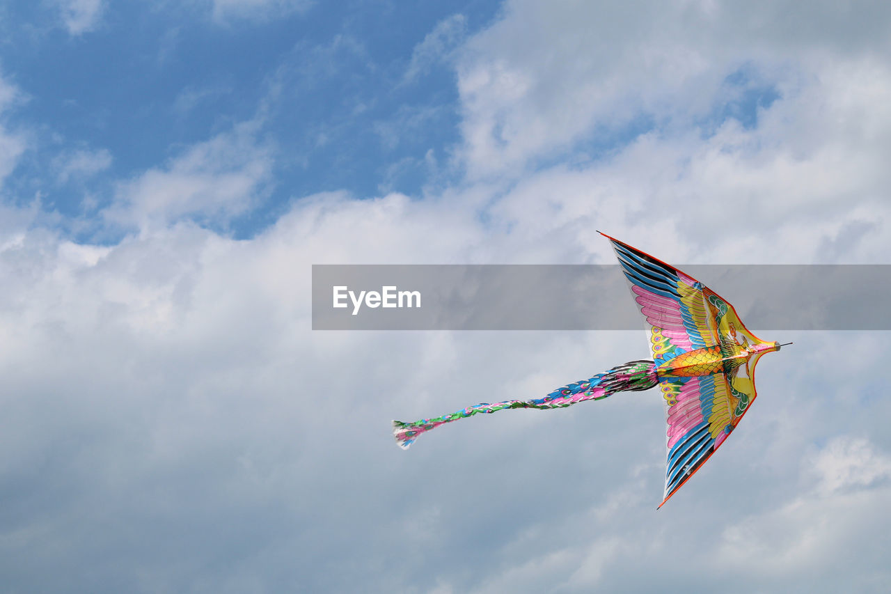 Low angle view of kite flying in the sky