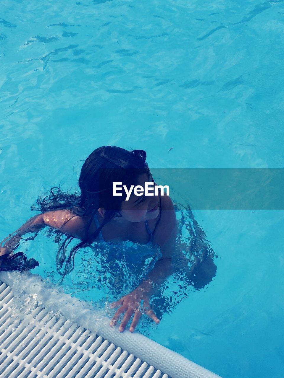 High angle view of woman in swimming pool