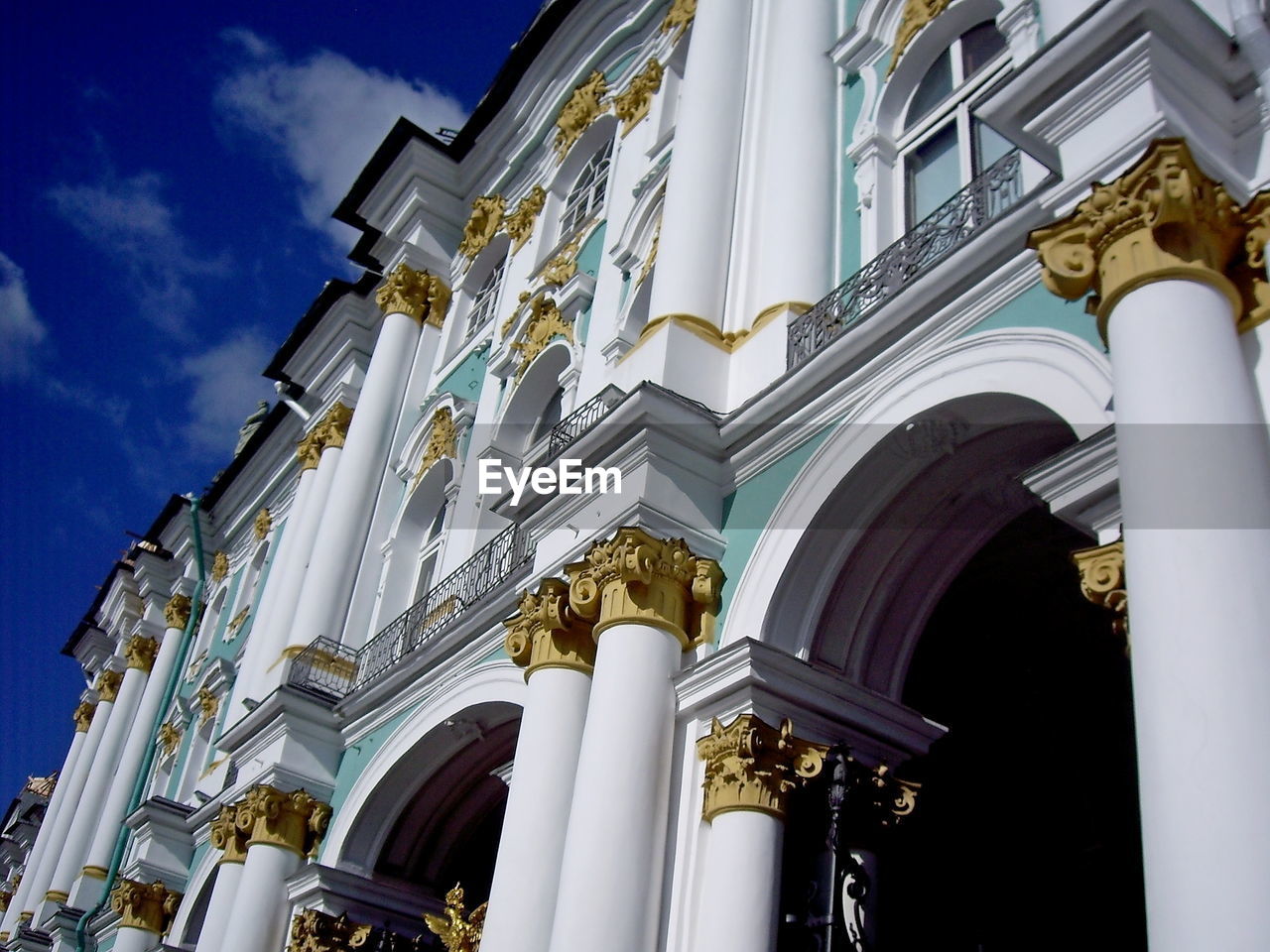 Low angle view of ornate building against sky