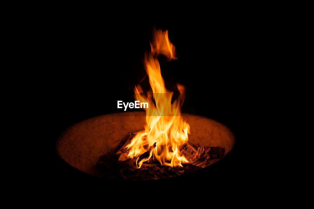 flame, burning, fire, heat, campfire, nature, no people, glowing, black background, orange color, darkness, close-up, wood, indoors, fireplace, motion, copy space, lighting, night, dark, studio shot
