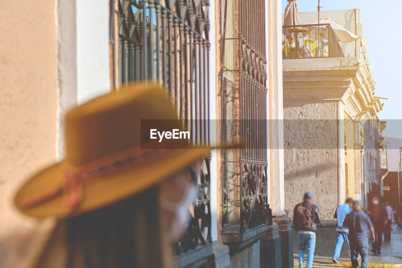 Tourist woman walking on vacation in street, arequipa, peru. selective focus