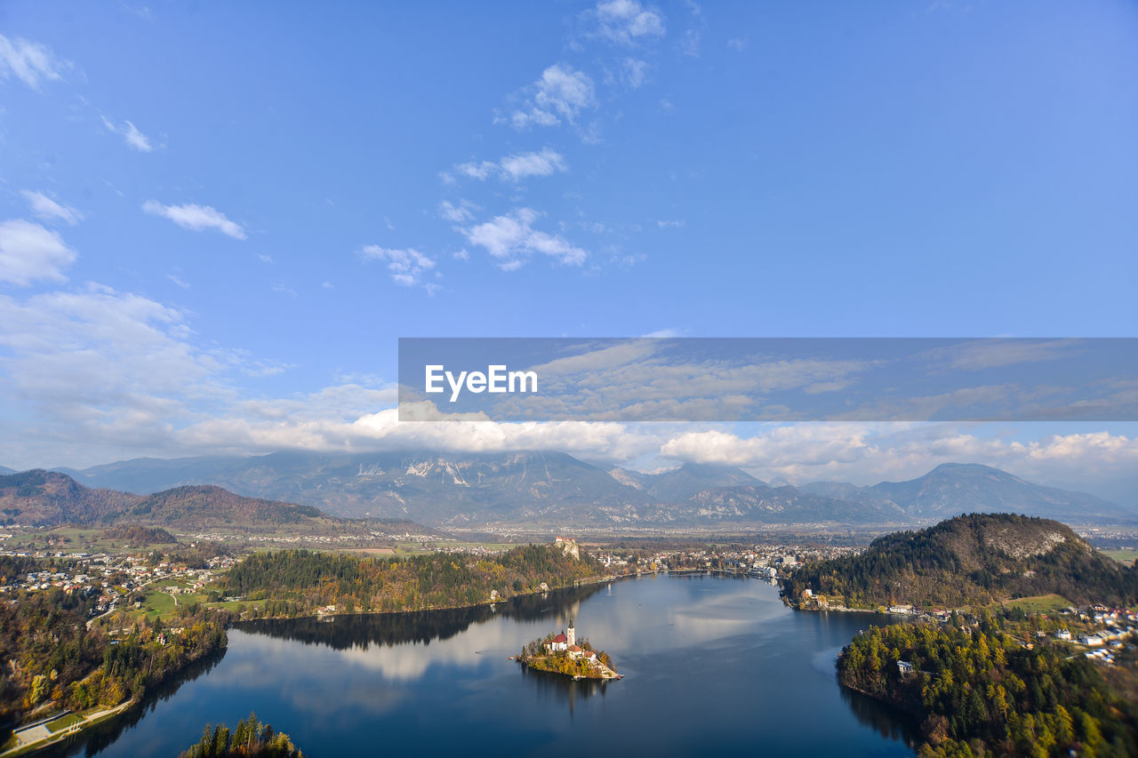 Scenic view of mountains against blue sky