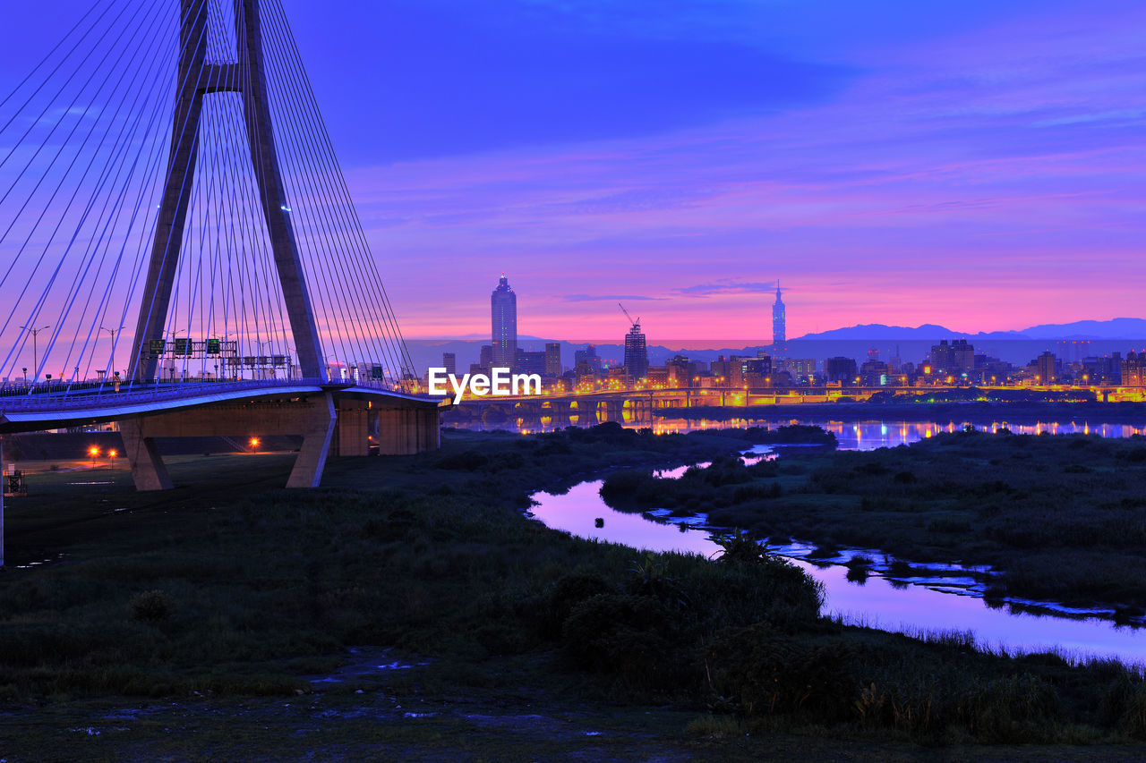 View of suspension bridge at night