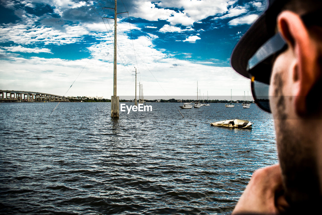 Man looking at water