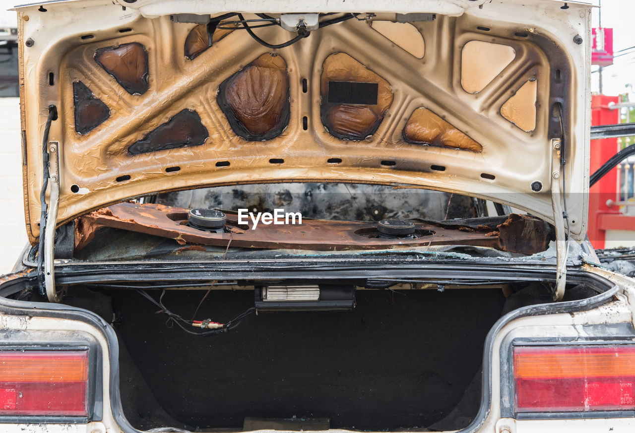 REAR VIEW OF CAR ON METAL