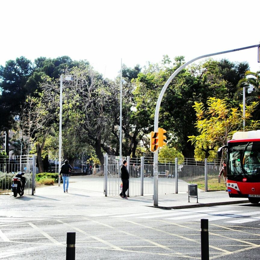 PEOPLE WALKING ON ROAD