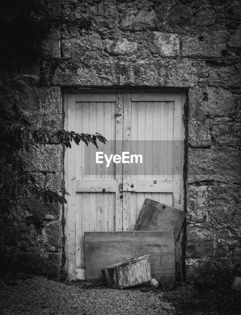 CLOSED DOOR OF ABANDONED HOUSE