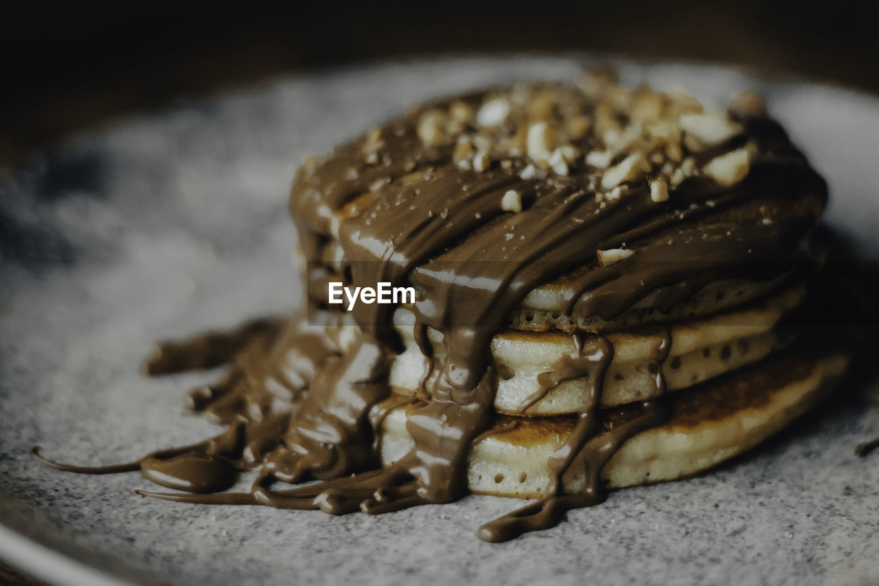 Close-up of chocolate cake in plate on table