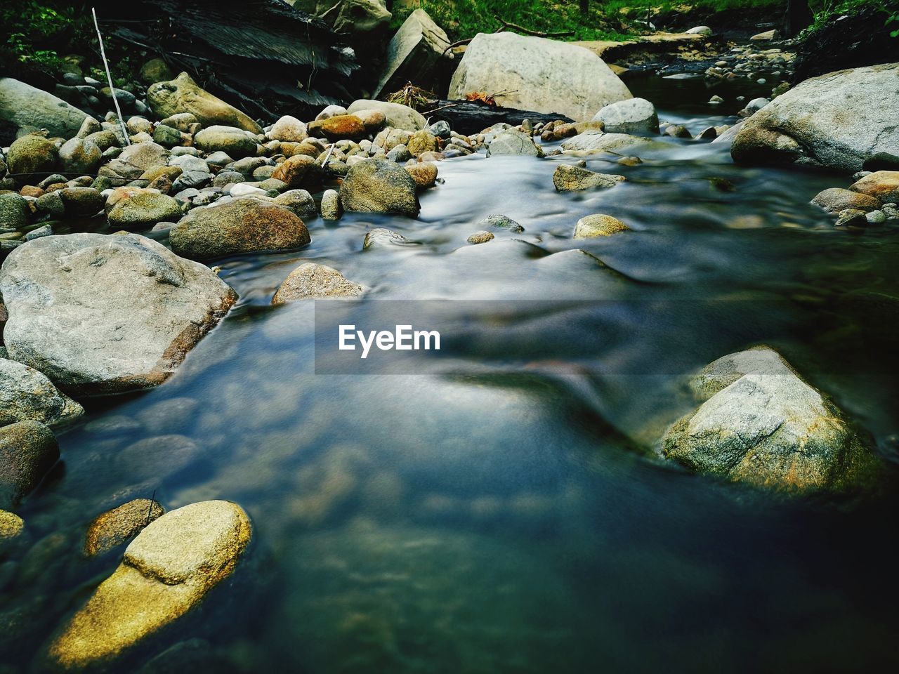 VIEW OF ROCKS IN WATER