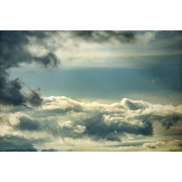 SCENIC VIEW OF CLOUDY SKY OVER LANDSCAPE