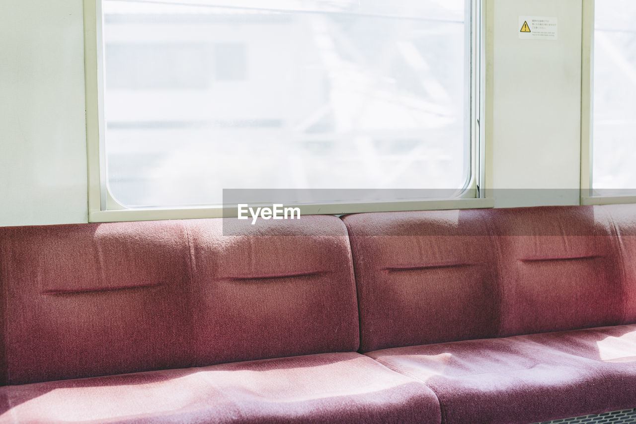 Sunlight falling on empty seats in train