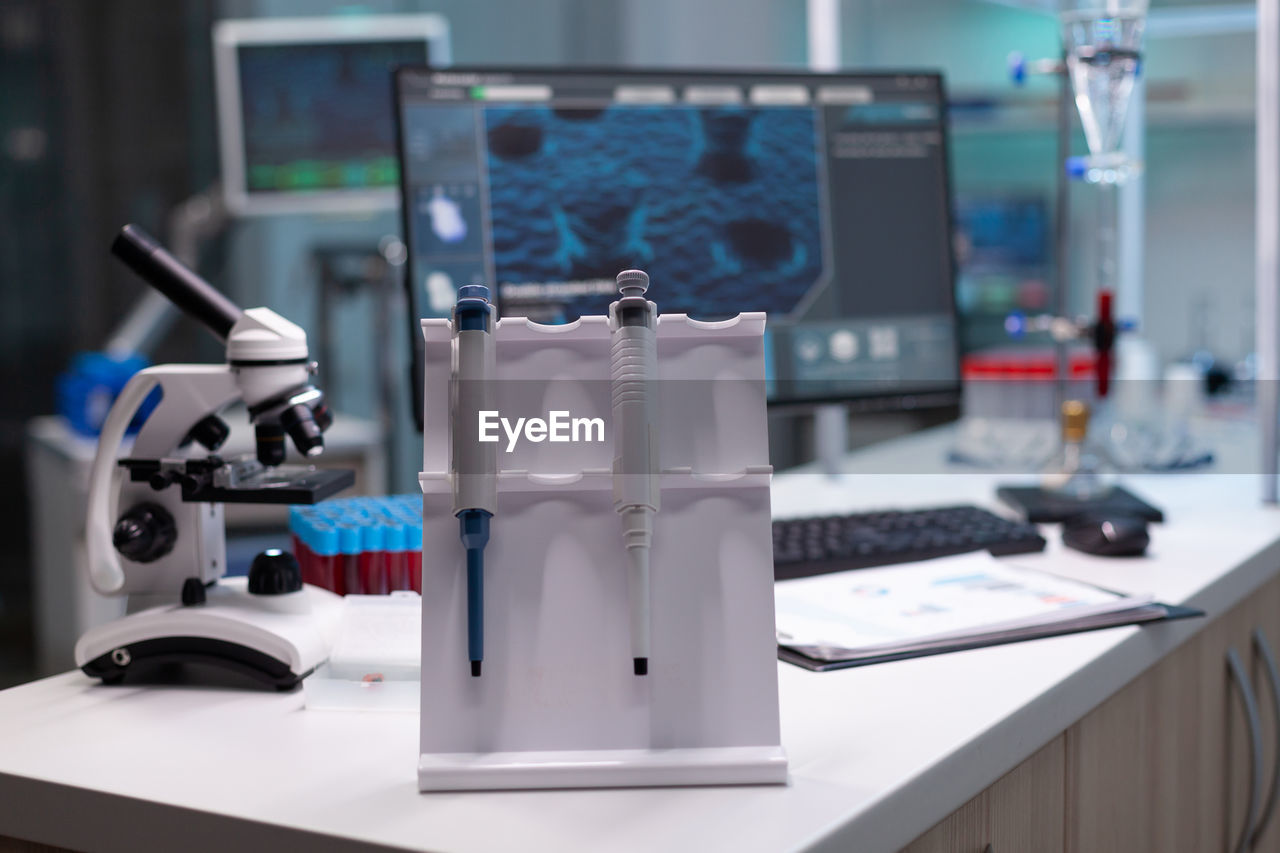 Close-up of scientific equipment on table