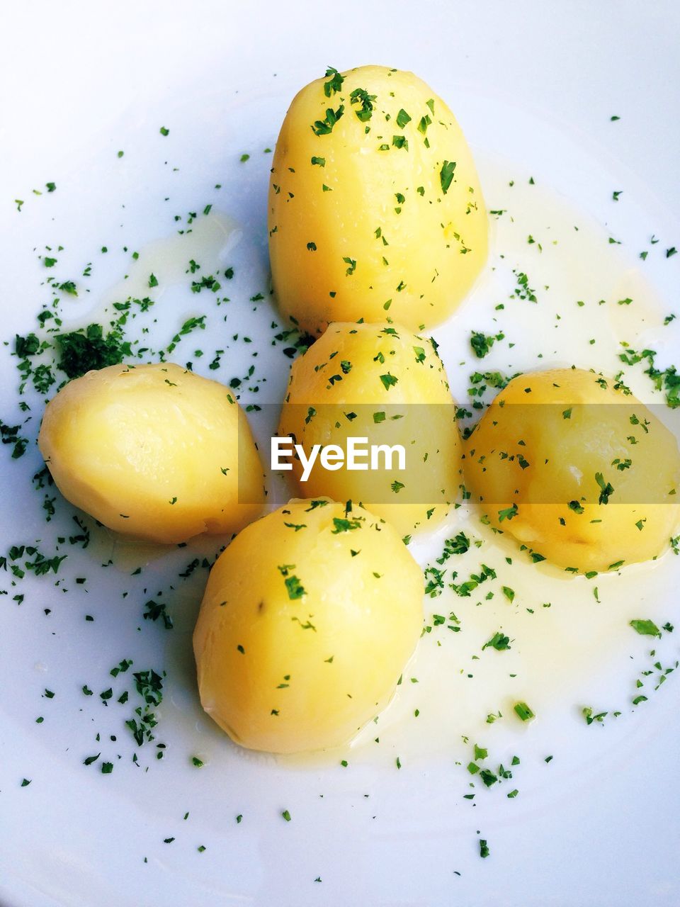 Close-up of serving boiled potatoes in plate