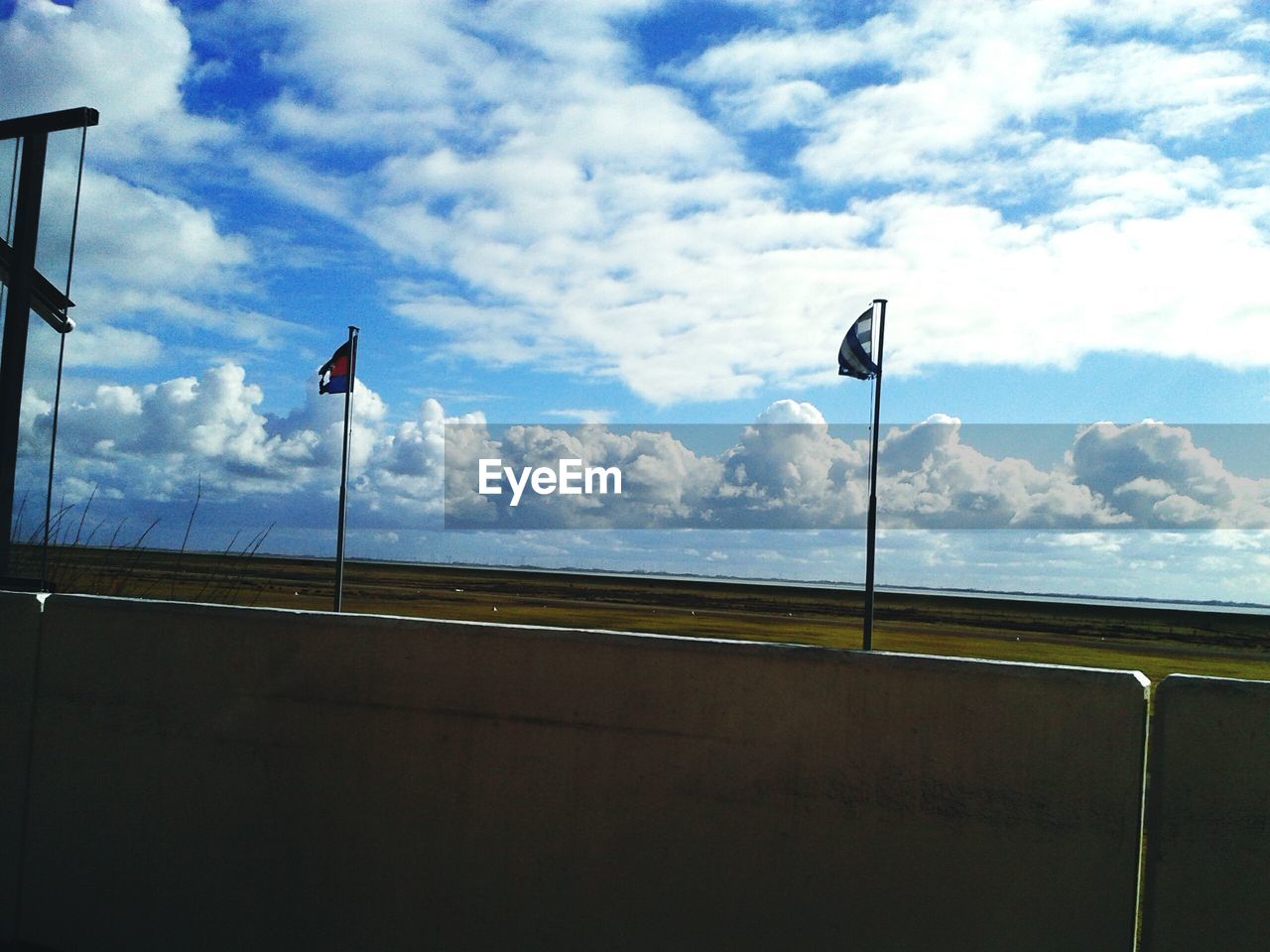 ROAD SIGN AGAINST SKY