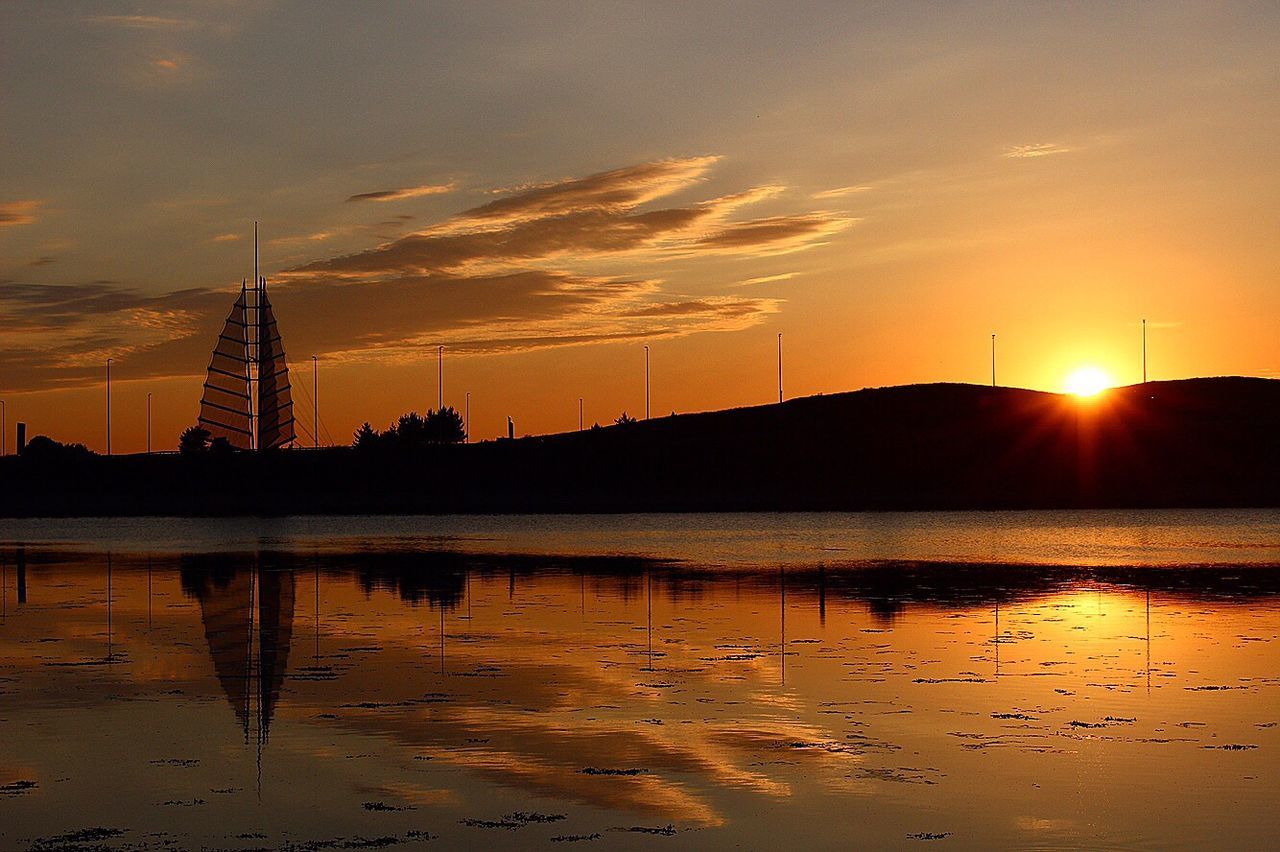 Silhouette of buildings at sunset