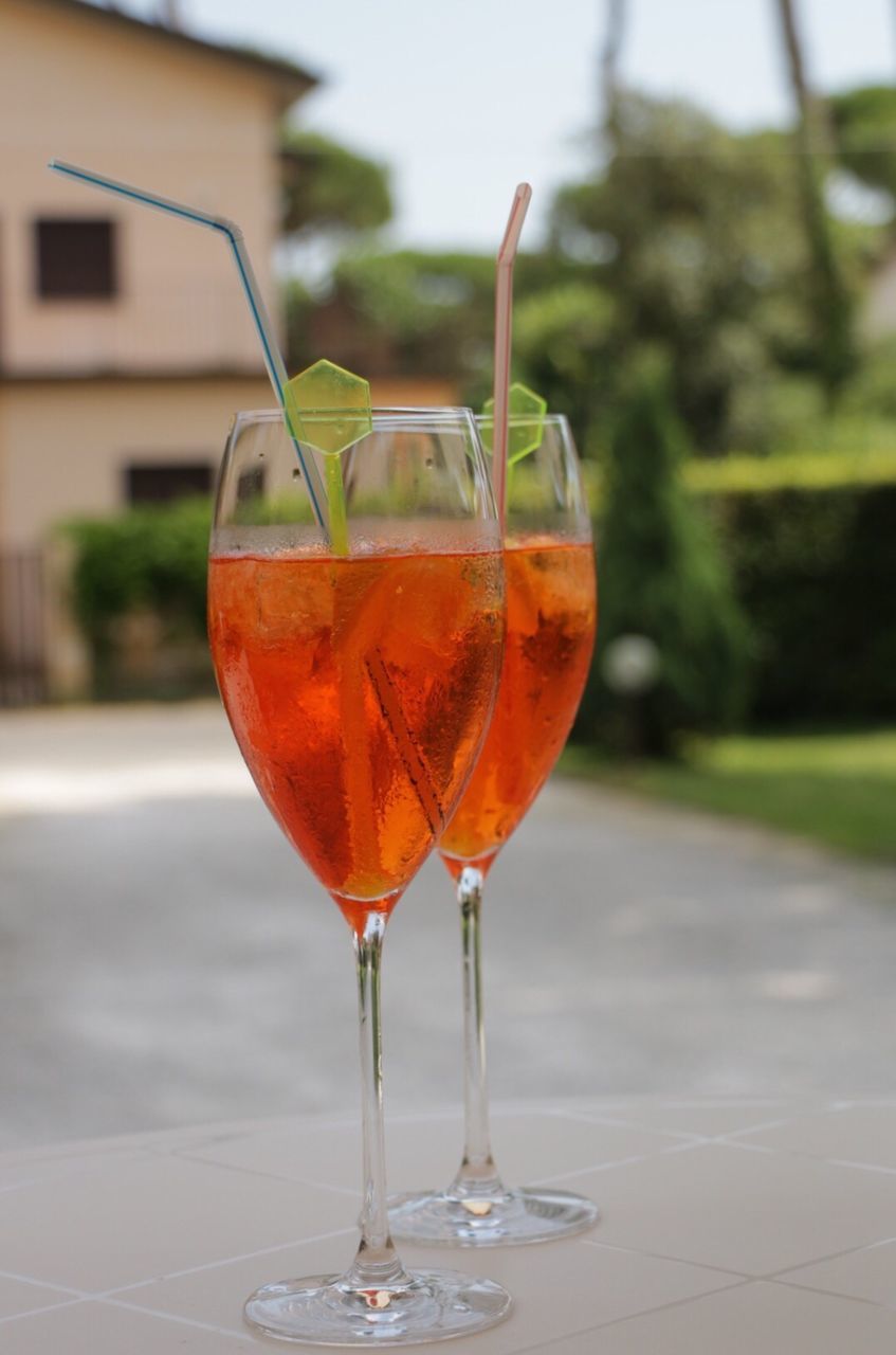 Glass of cocktail drinks on outdoor table