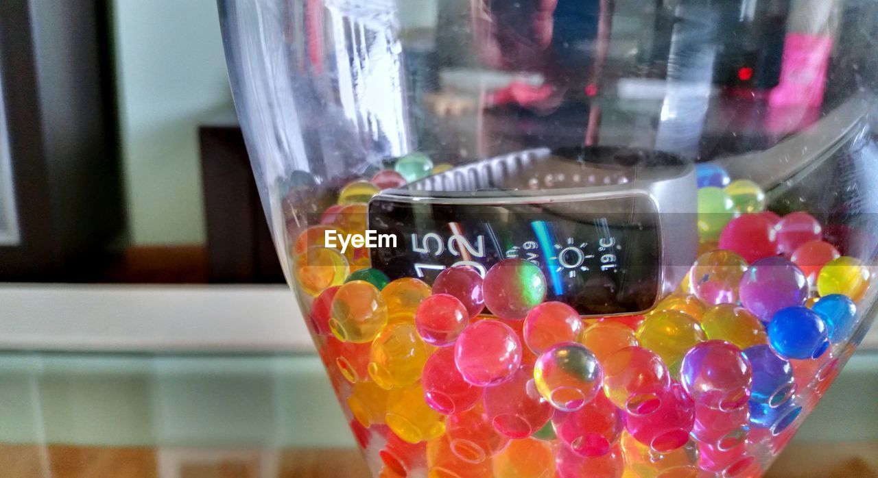 CLOSE-UP OF DRINK ON TABLE