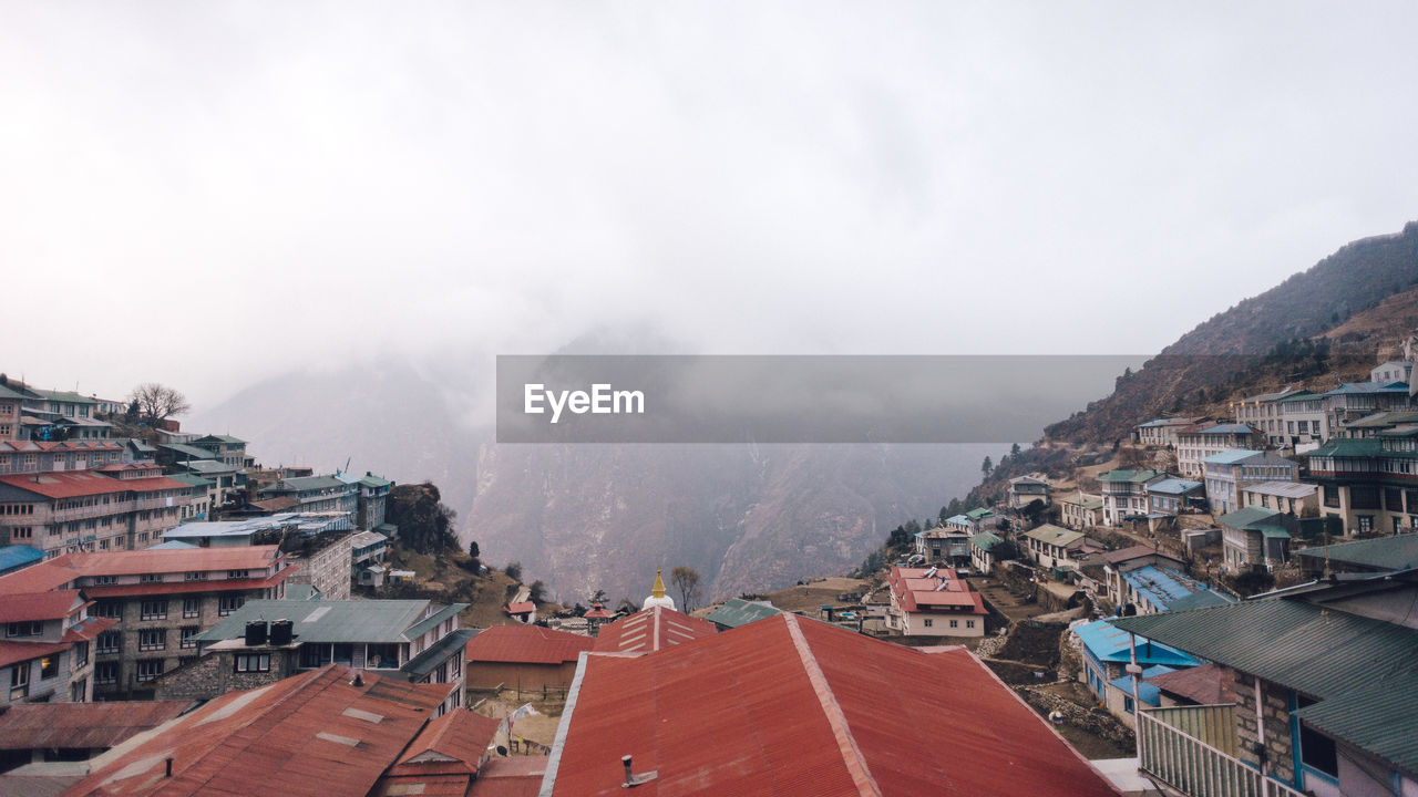 High angle view of townscape during foggy weather