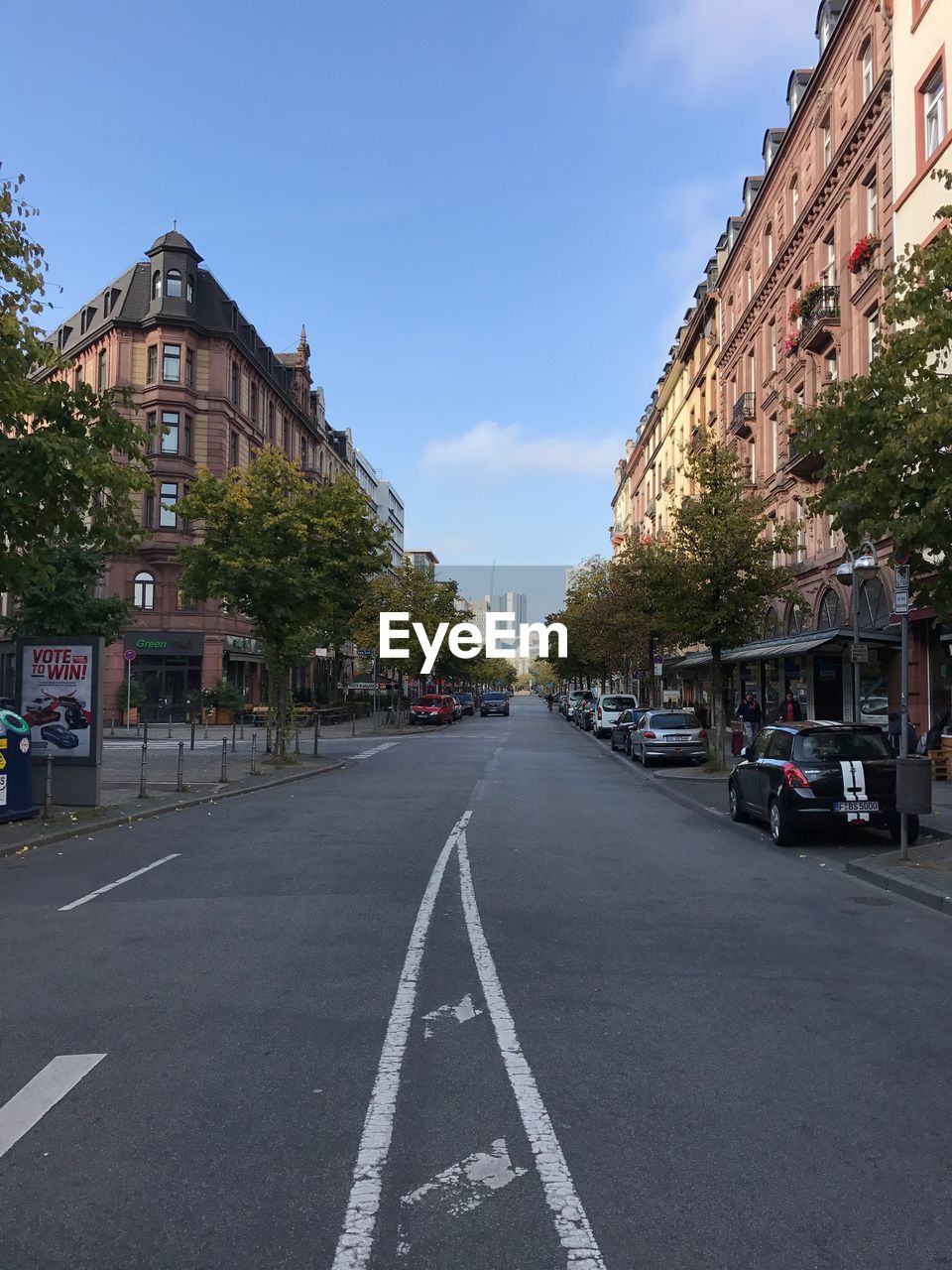 VIEW OF CITY STREET AND RESIDENTIAL BUILDINGS