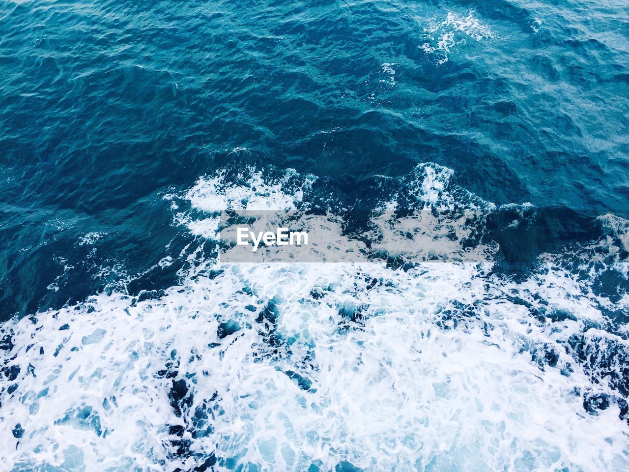 High angle view of waves in sea