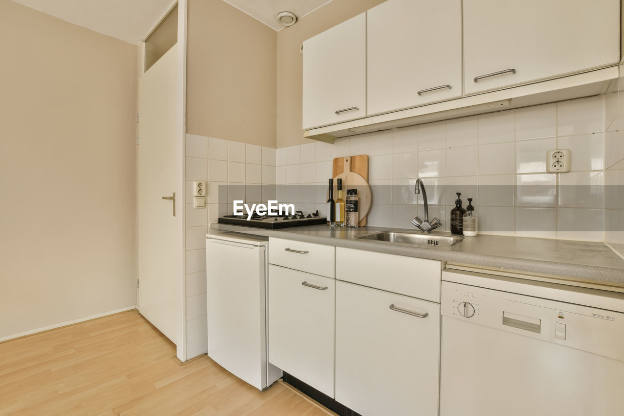 high angle view of kitchen utensils on floor at home