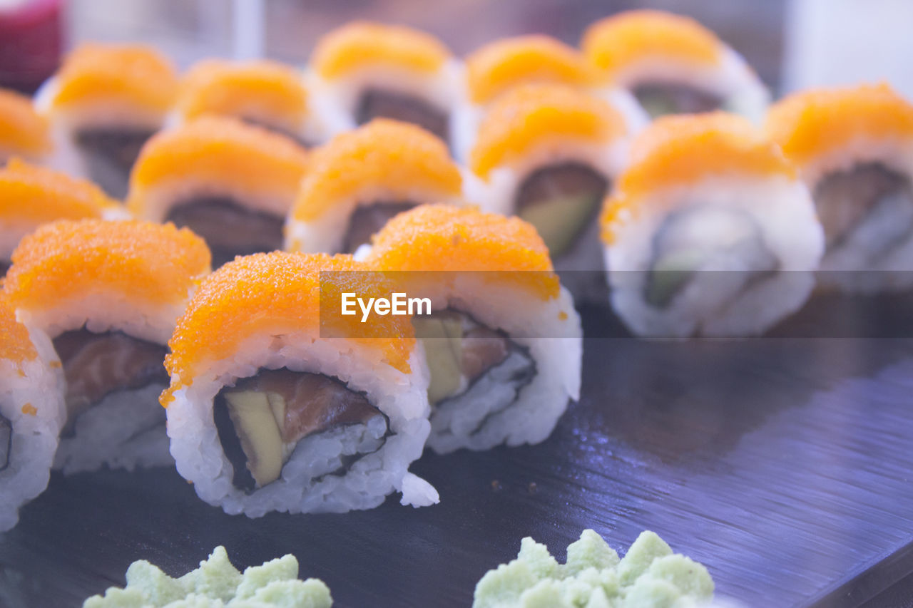 CLOSE-UP OF SUSHI IN PLATE