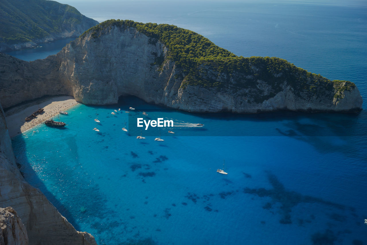 Aerial view of rock formation in sea