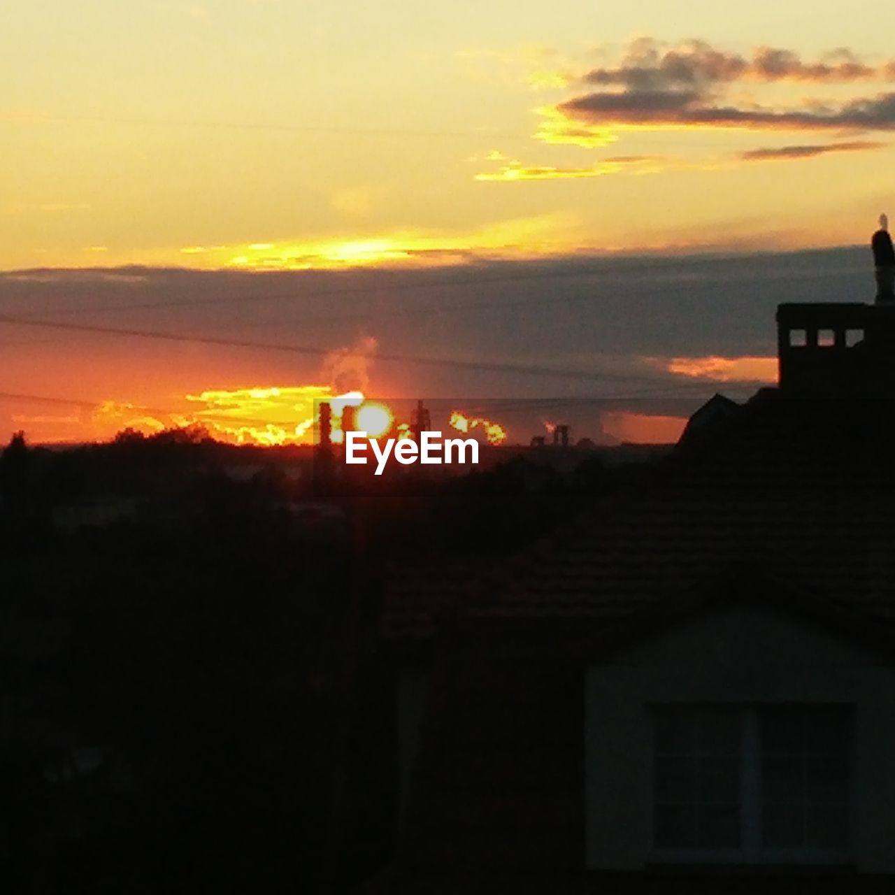 SCENIC VIEW OF DRAMATIC SKY DURING SUNSET