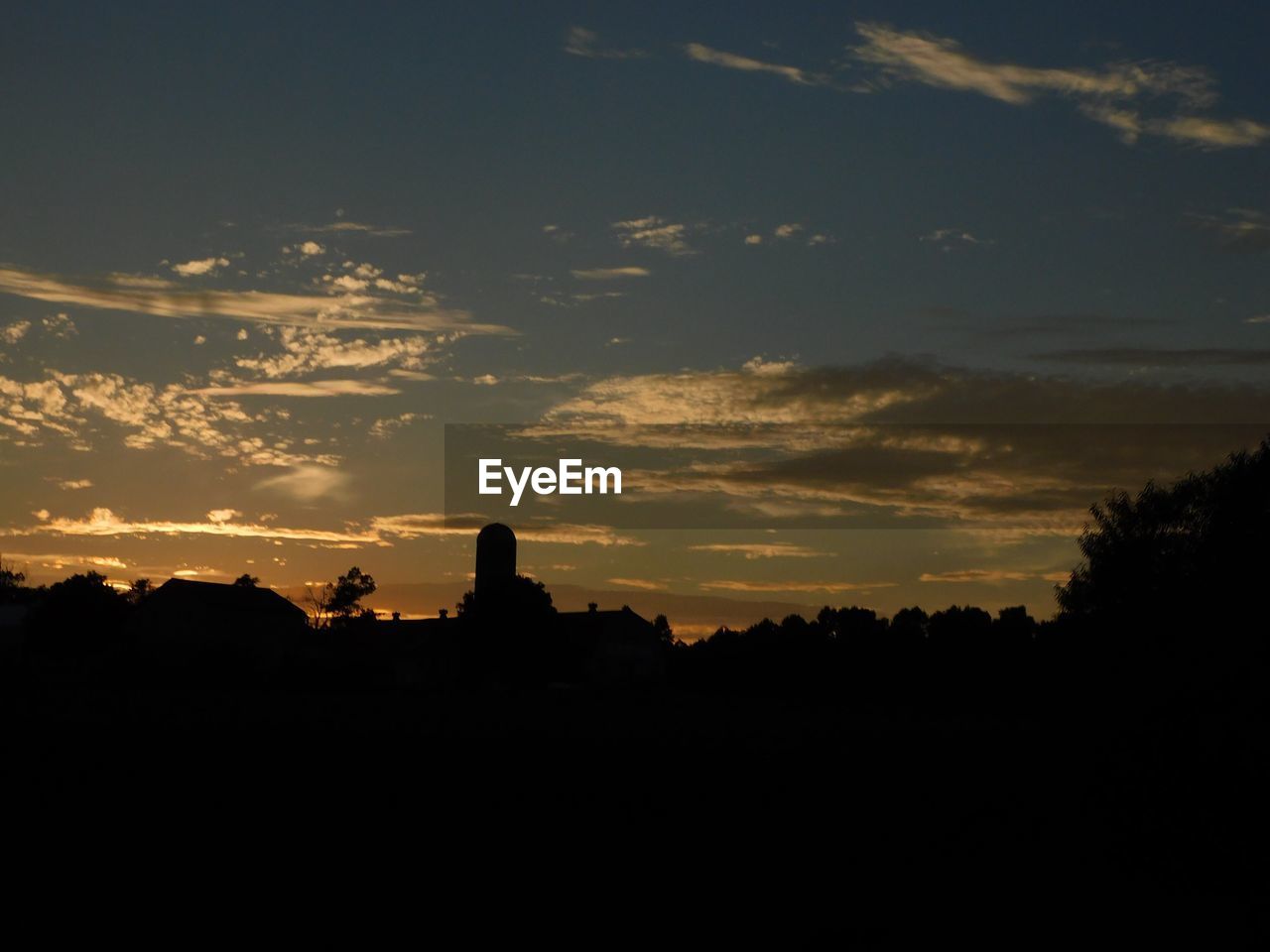 SCENIC VIEW OF SILHOUETTE LANDSCAPE AGAINST SKY DURING SUNSET