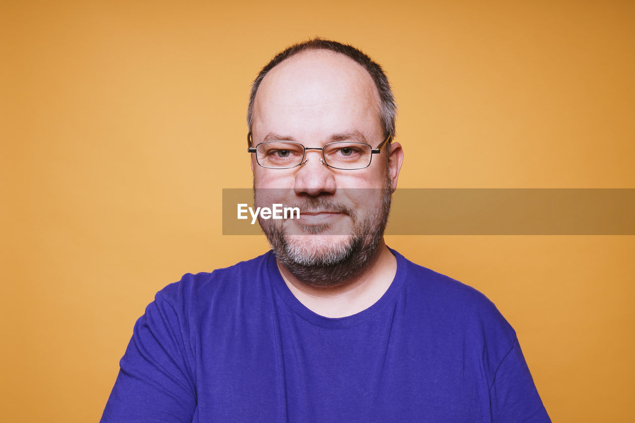 Smiling mature man wearing glasses