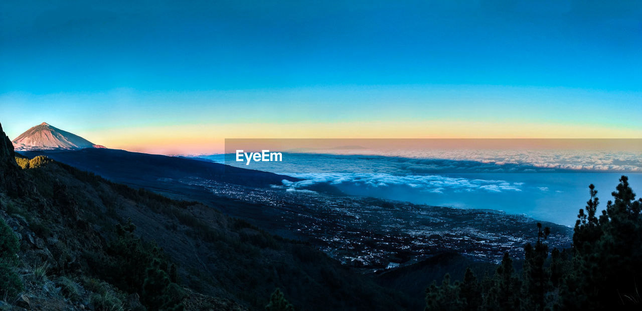 AERIAL VIEW OF CITY DURING SUNSET