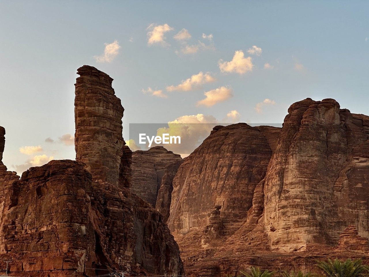 rock, rock formation, sky, nature, landscape, travel destinations, environment, scenics - nature, travel, arch, land, beauty in nature, geology, cloud, no people, non-urban scene, cliff, desert, mountain, outdoors, terrain, tranquility, valley, formation, tourism, wadi, canyon, eroded, plant, sunset, tranquil scene, sandstone, semi-arid, natural environment