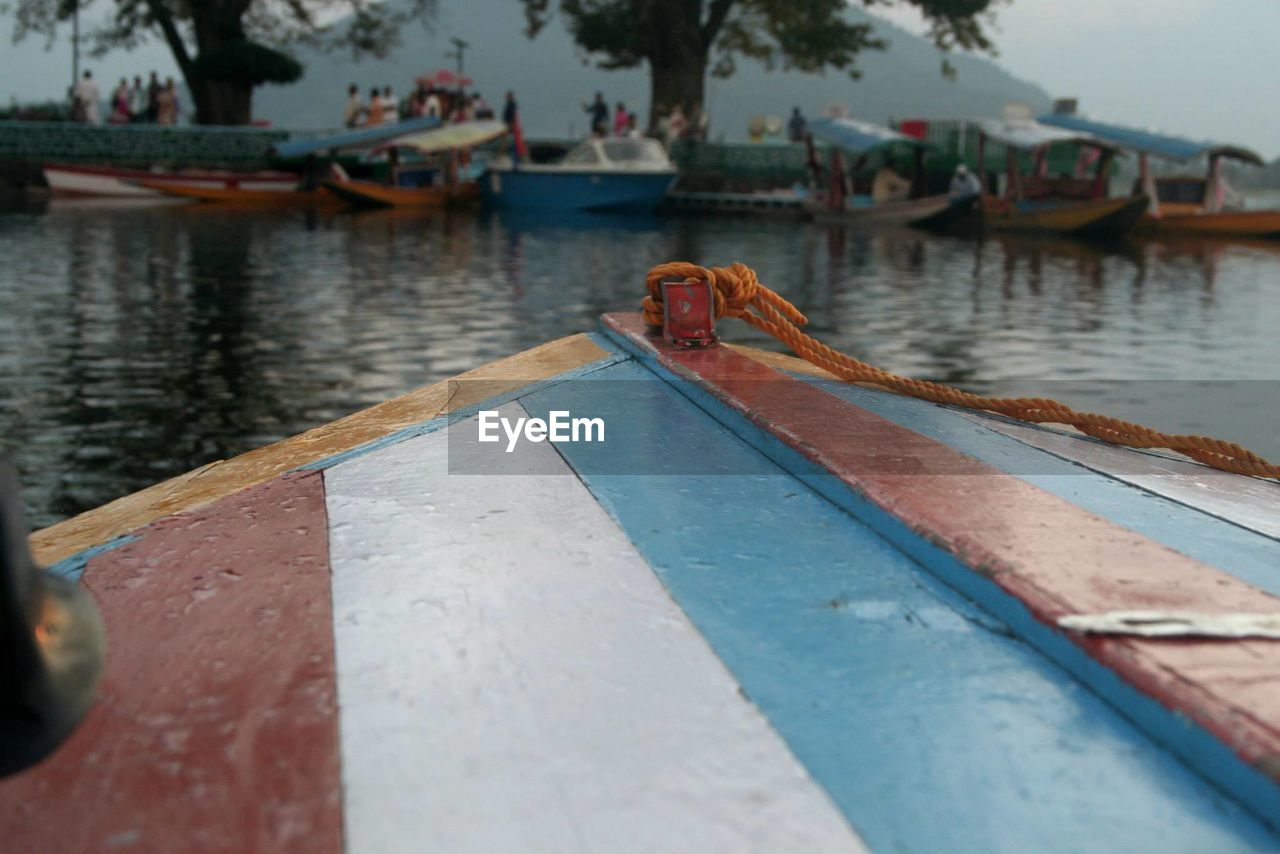 Cropped image of wooden boat on river