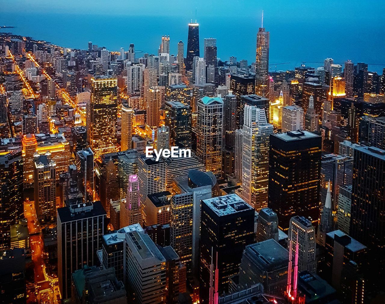 Chicago - aerial view with the skyline and illuminated buildings