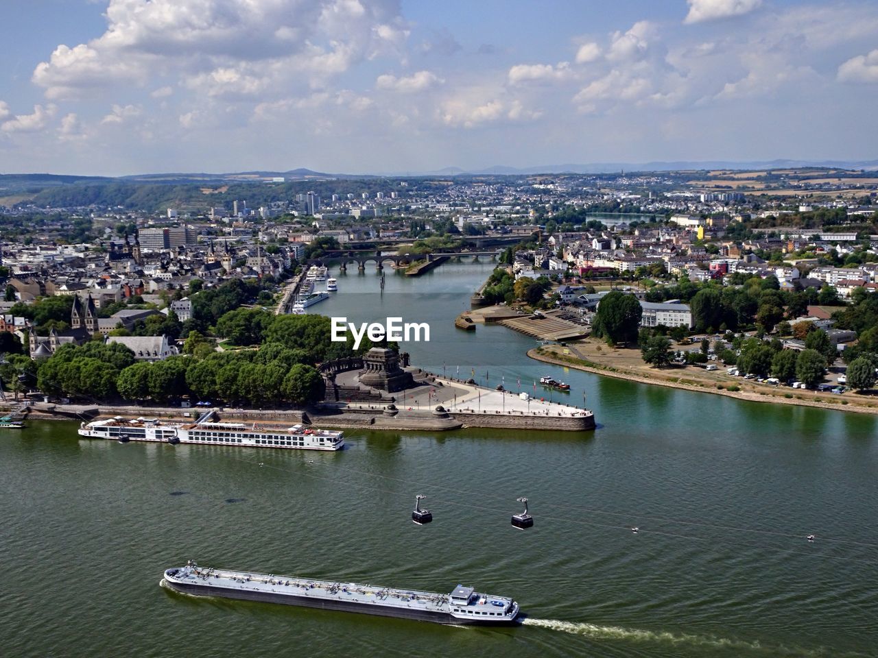 High angle view of river amidst buildings in city