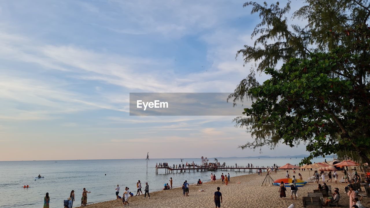 GROUP OF PEOPLE ON BEACH