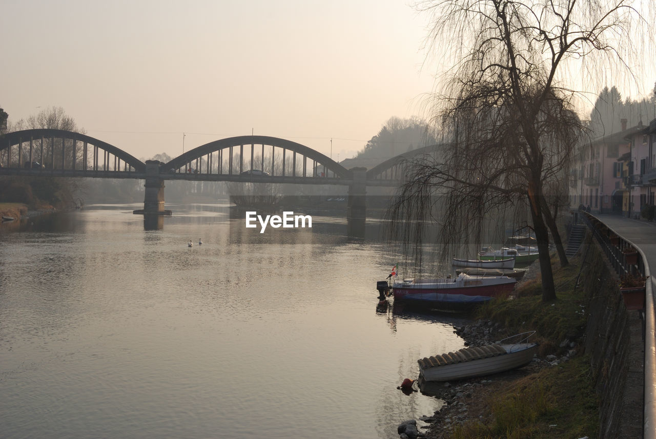 Bridge over river against clear sky