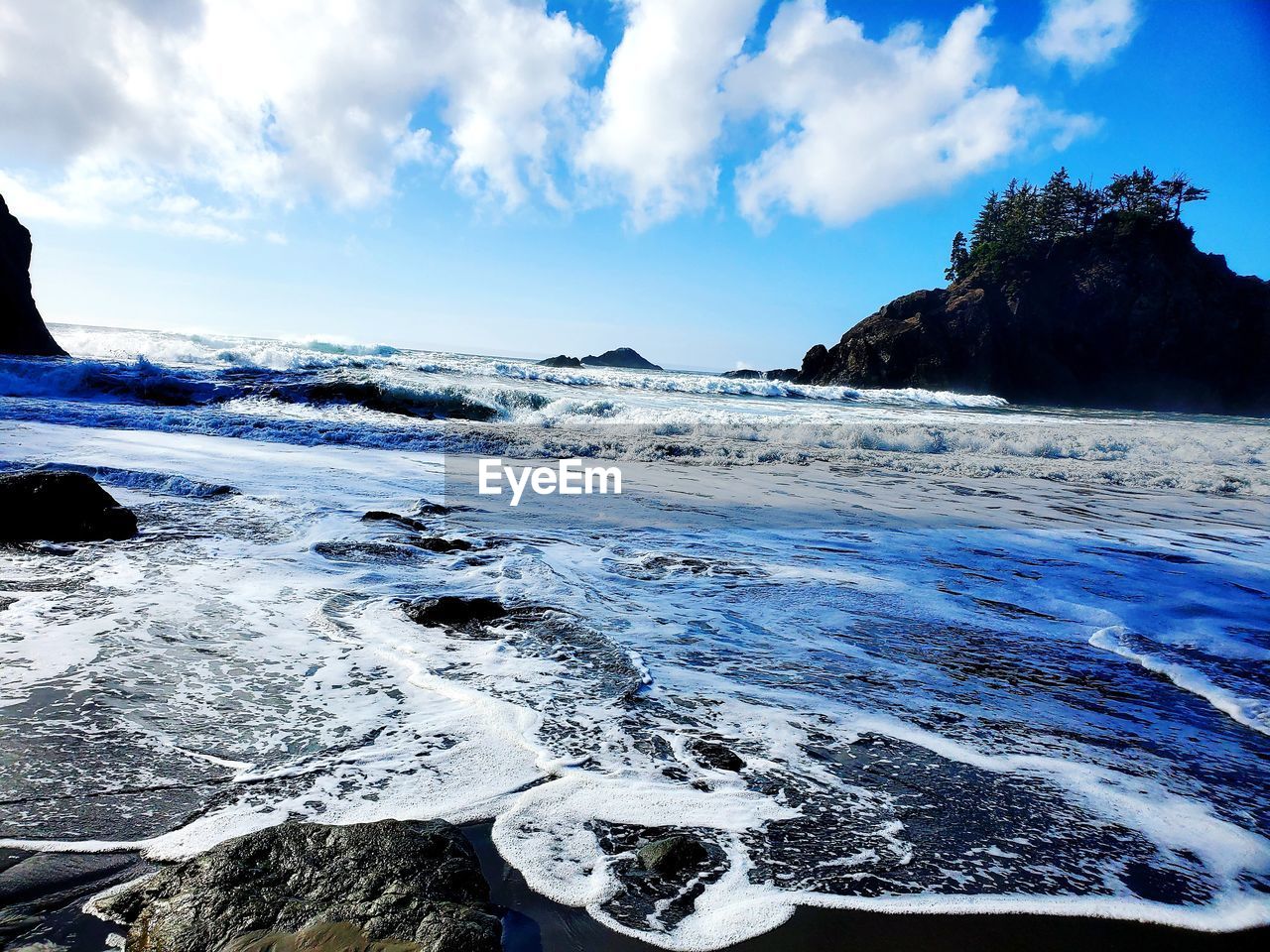 water, ocean, sea, sky, wave, coast, scenics - nature, land, beauty in nature, environment, nature, cloud, landscape, beach, wind wave, shore, rock, travel destinations, travel, blue, ice, cold temperature, motion, no people, outdoors, snow, body of water, horizon, sports, tranquility, coastline, tourism, lagoon, tranquil scene, mountain, winter, water sports, non-urban scene, seascape, holiday, day, bay, glacier, idyllic, trip, terrain