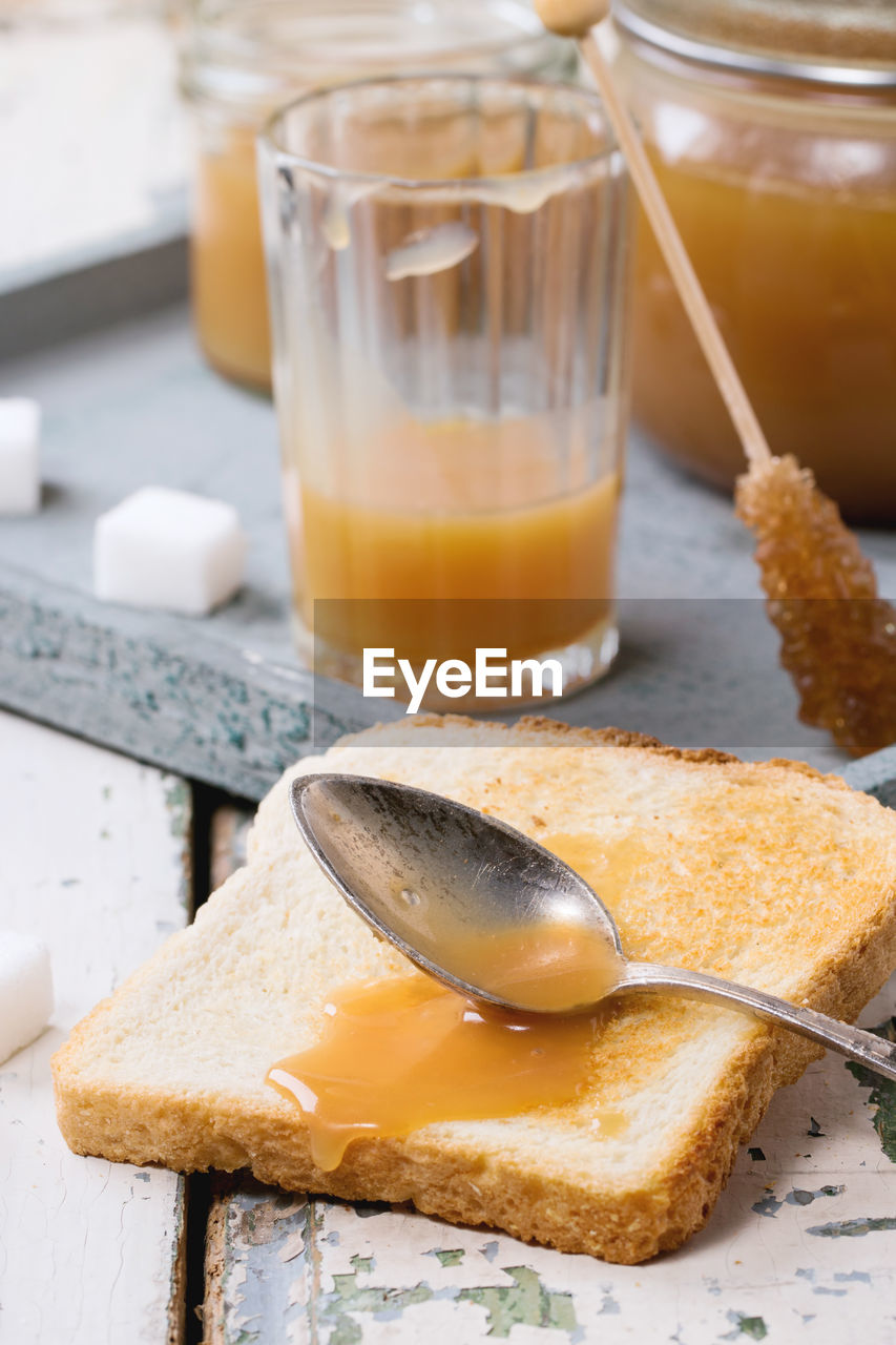 Elevated view of fresh honey tasting