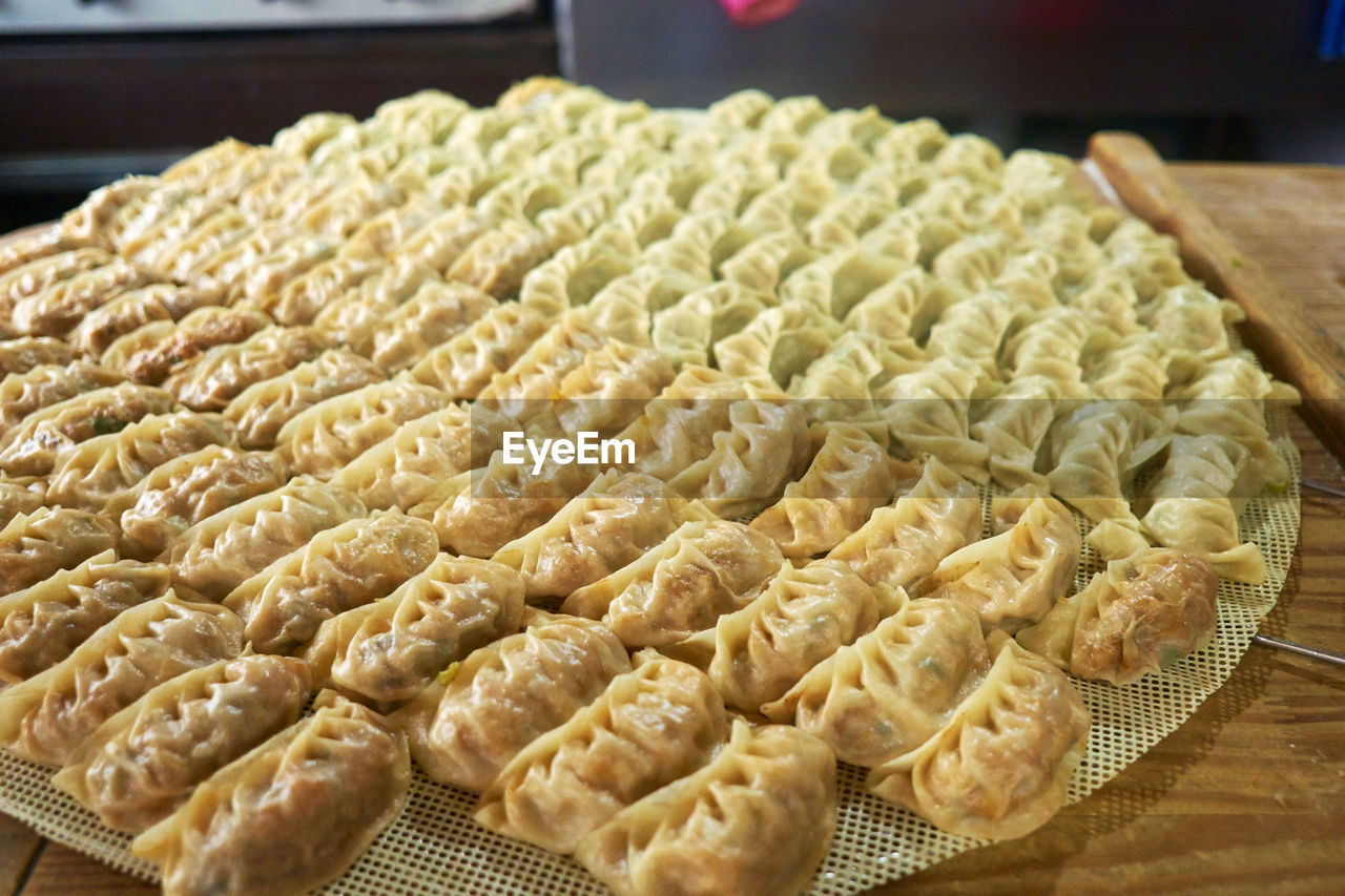 High angle view of dumplings on cooling rack