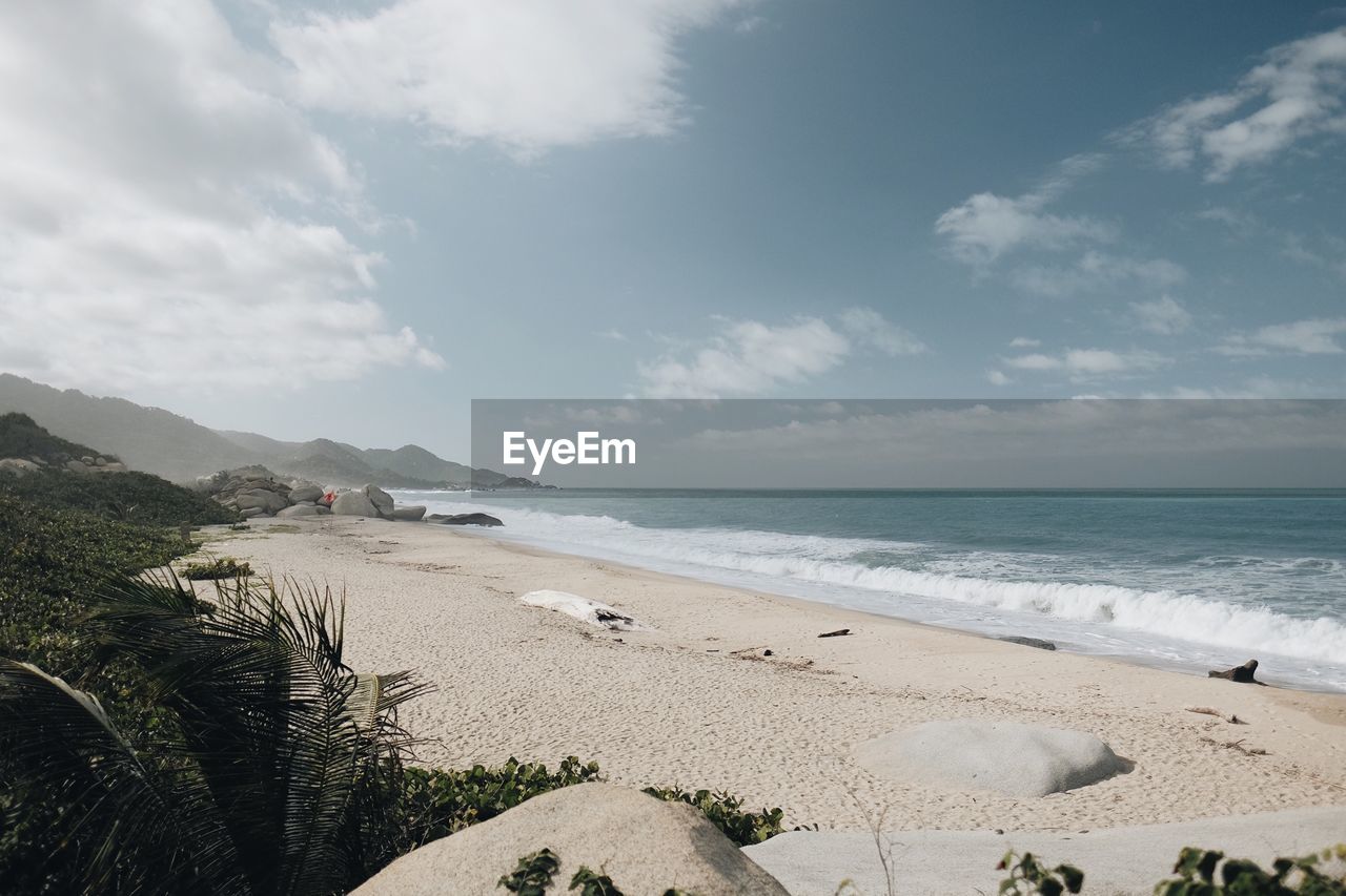 Scenic view of beach against sky