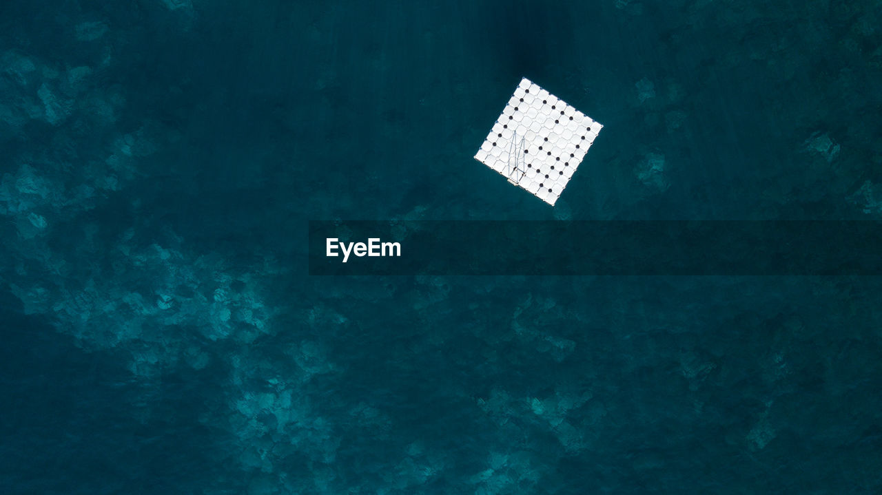 Aerial view of floating platform in sea