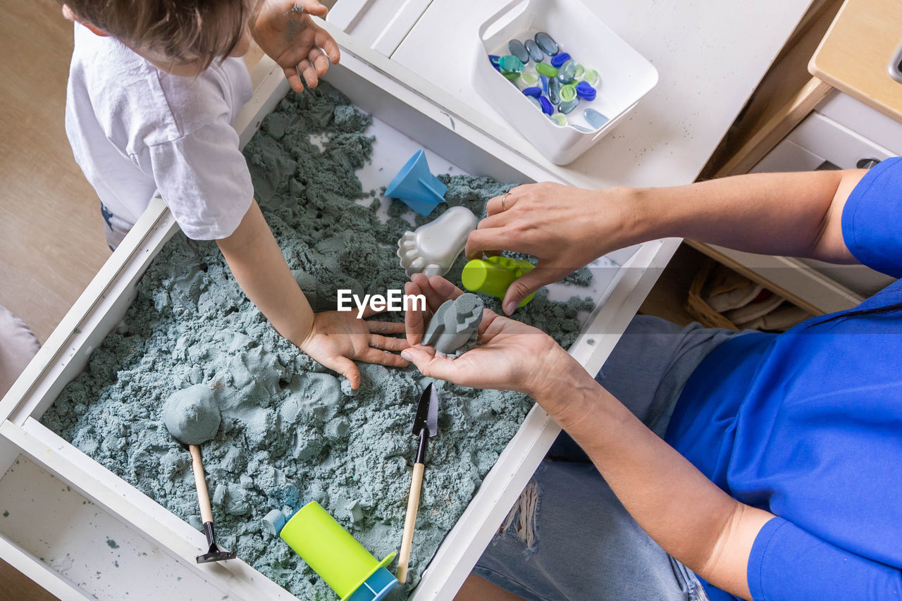 high angle view of man working at workshop