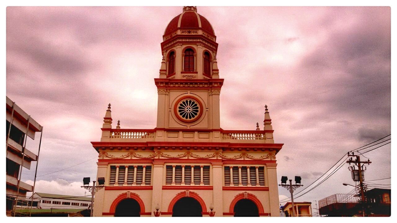 LOW ANGLE VIEW OF CLOCK TOWER AGAINST SKY