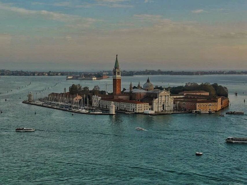 VIEW OF BUILDINGS IN FRONT OF SEA