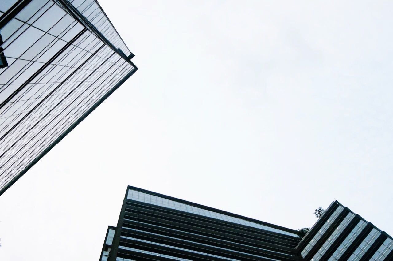 LOW ANGLE VIEW OF MODERN BUILDINGS