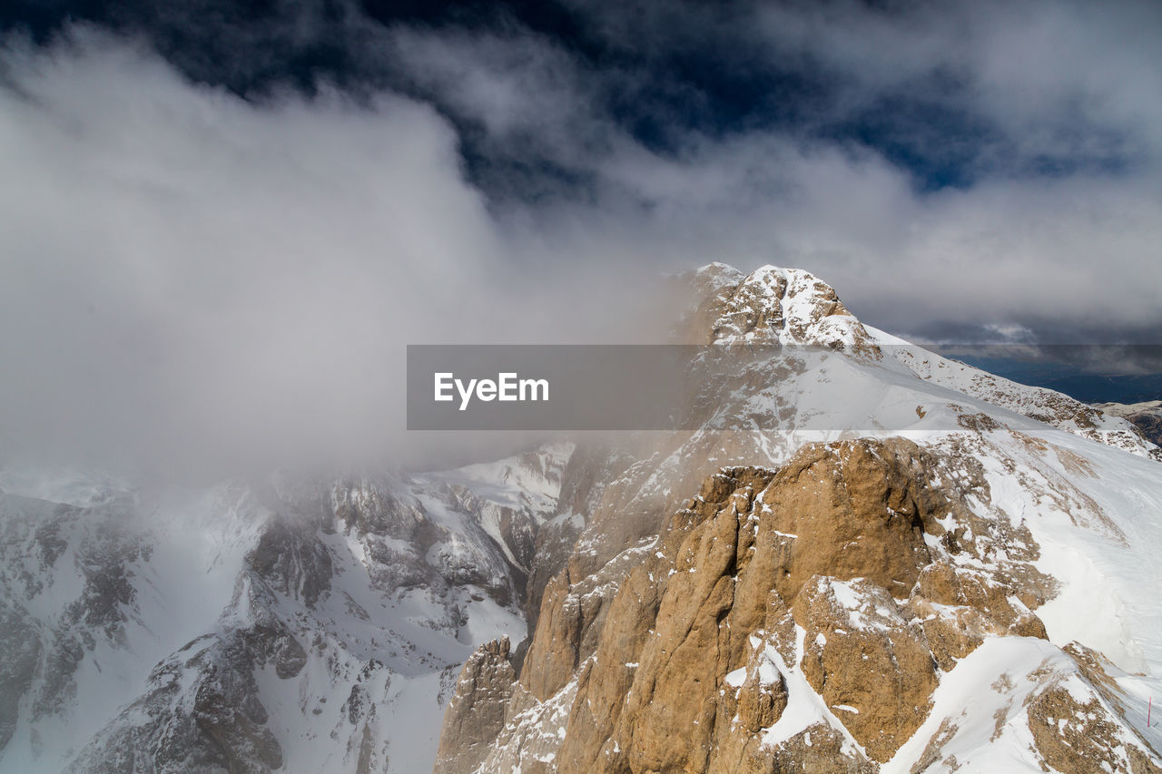 Scenic view of snowcapped mountains against sky. punta rocca. dolomites. italy