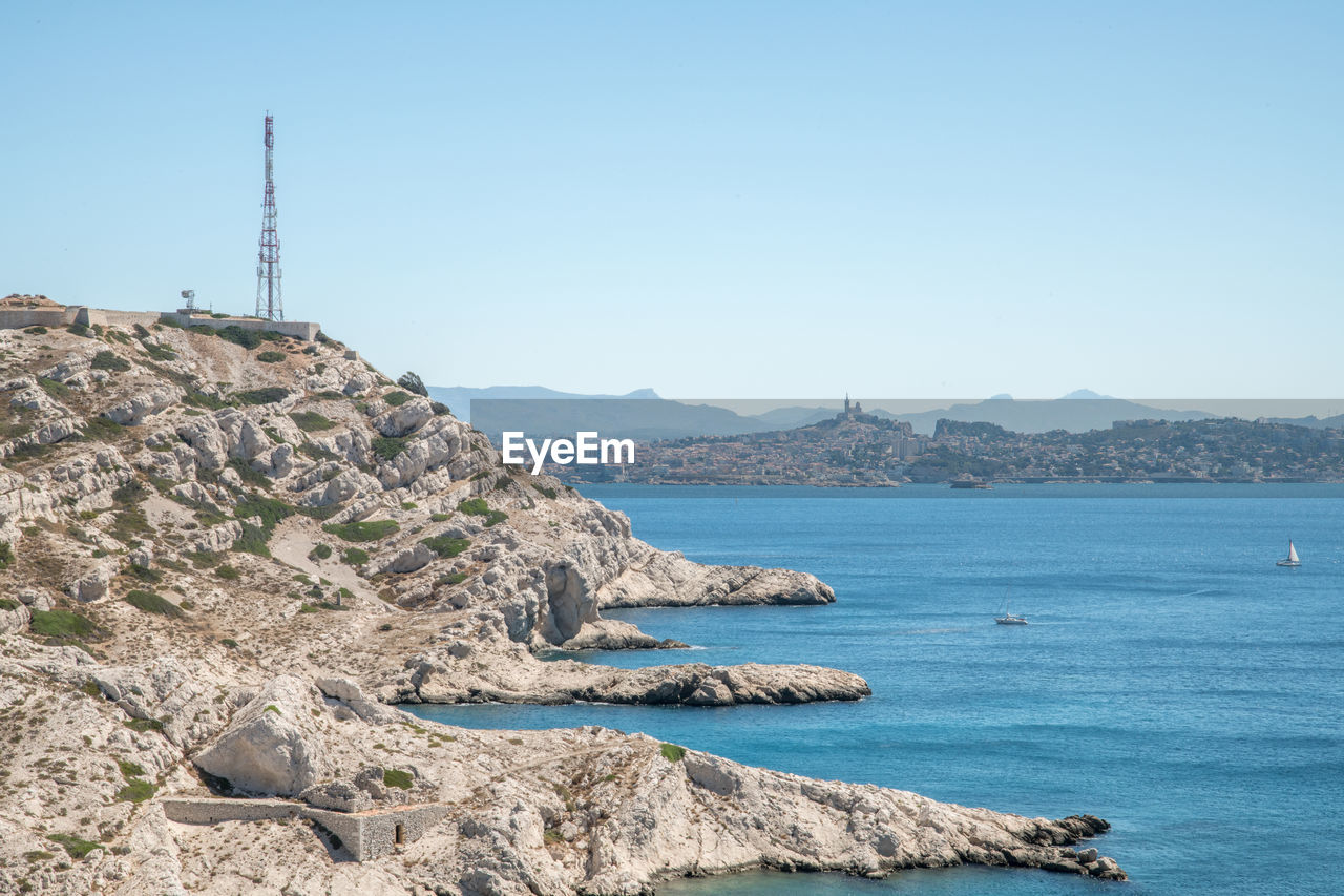 Scenic view of sea against clear sky